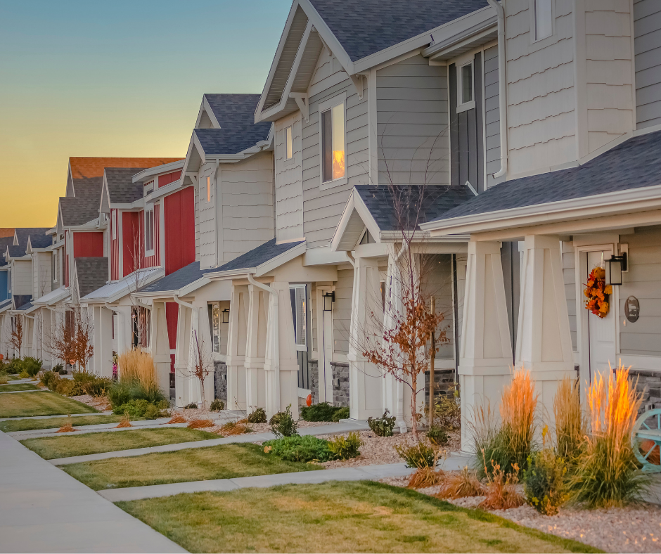 row of white and red townhomes